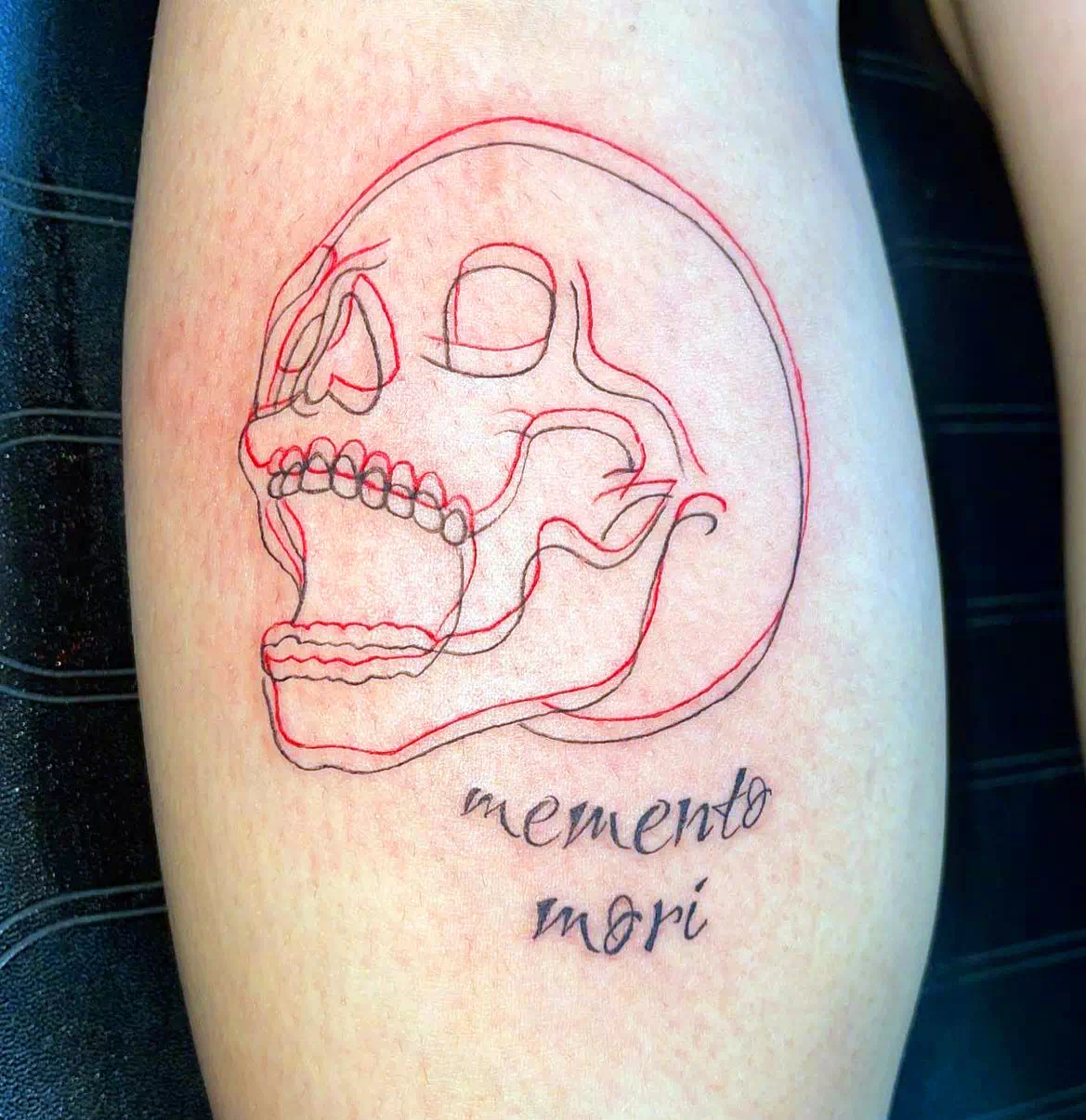 Small Calf Tattoo With Pop Of Red