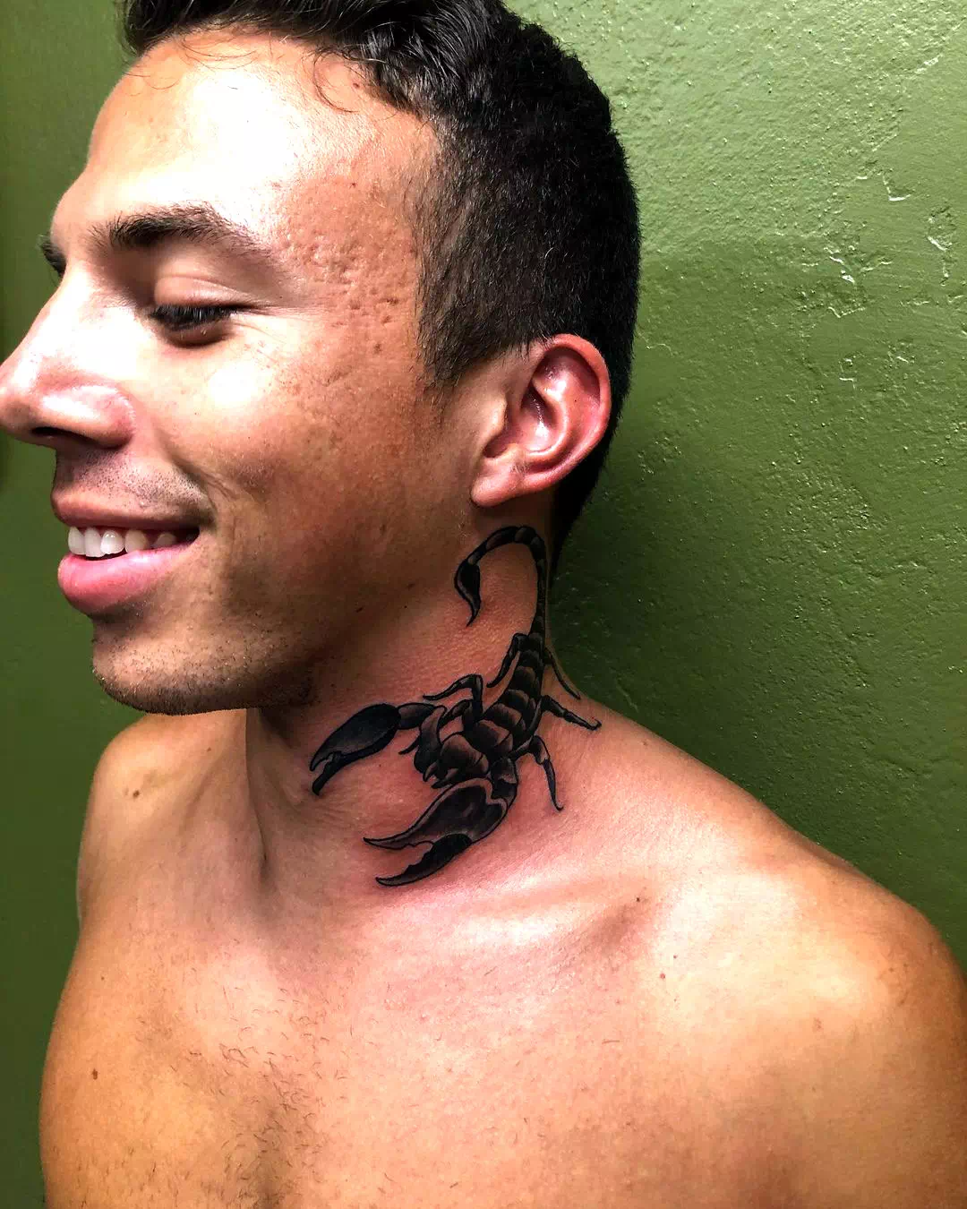 Small Scorpio Tattoo Over Neck