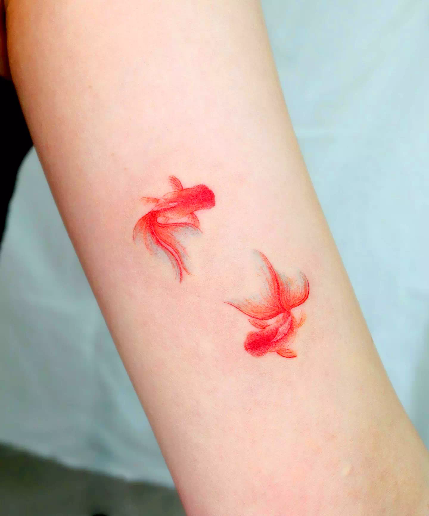 Las mejores ideas de tatuajes de peces koi pequeños 2