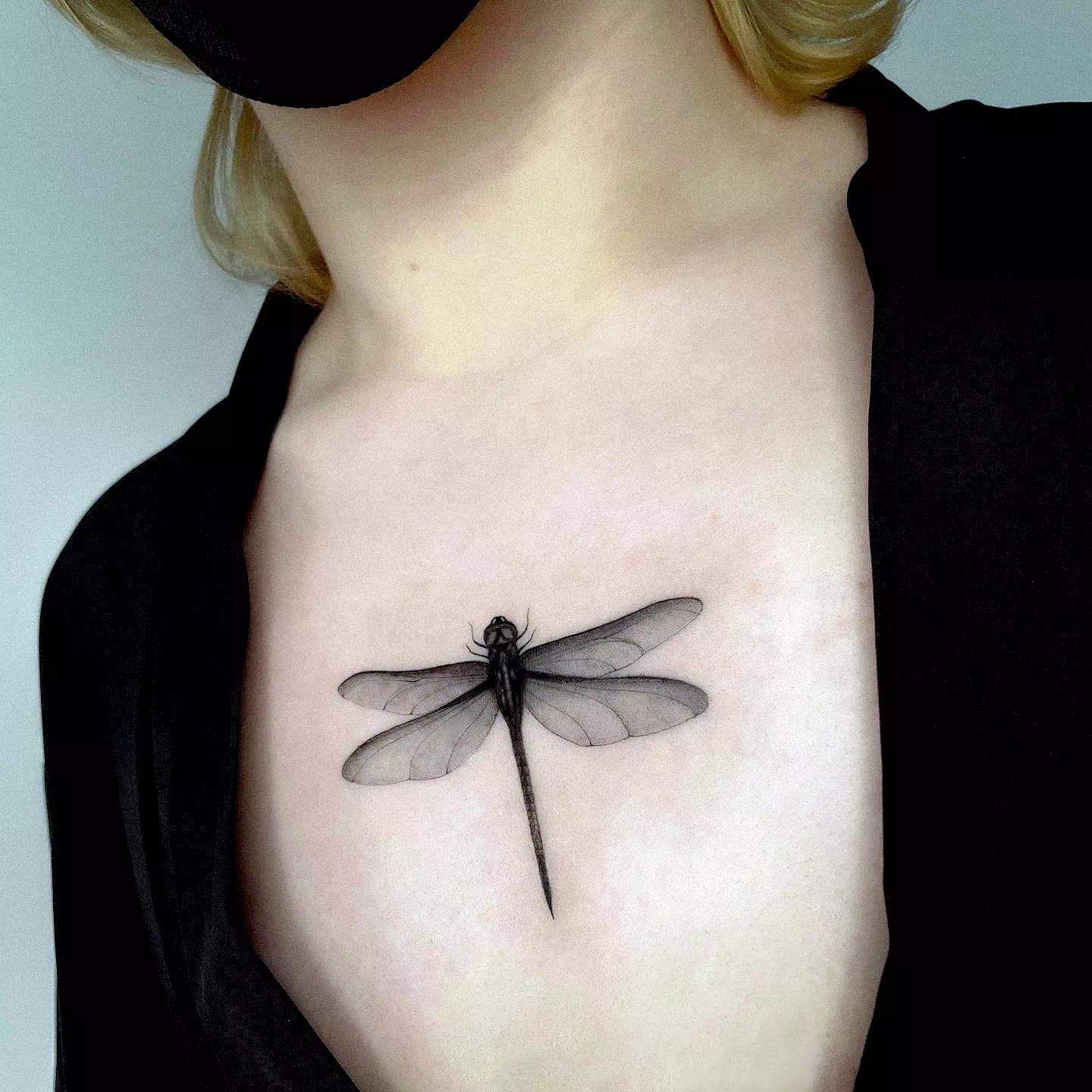 Black Tiny Dragonfly Tattoo