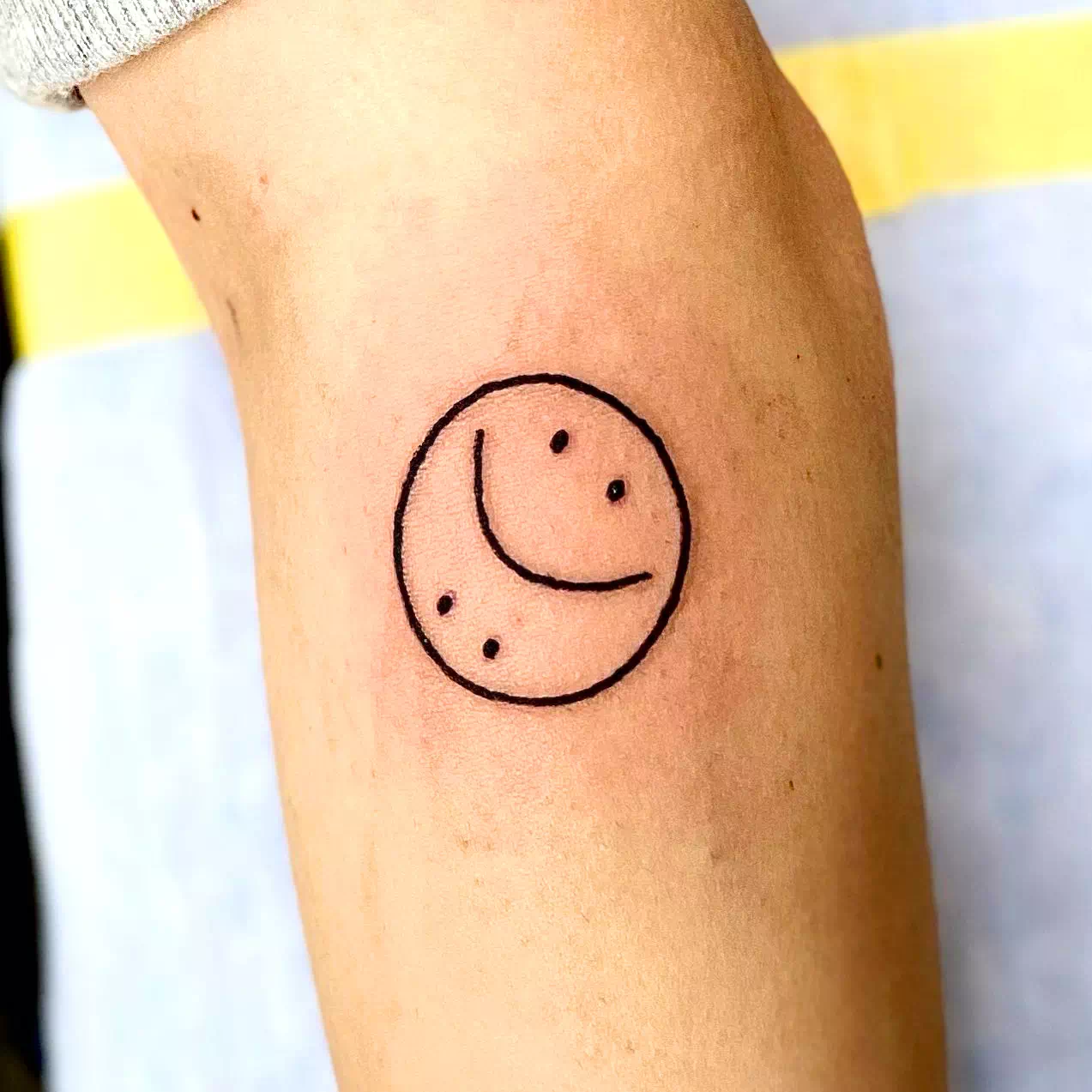 Ideas de diseño de tatuajes de sonrisas 18