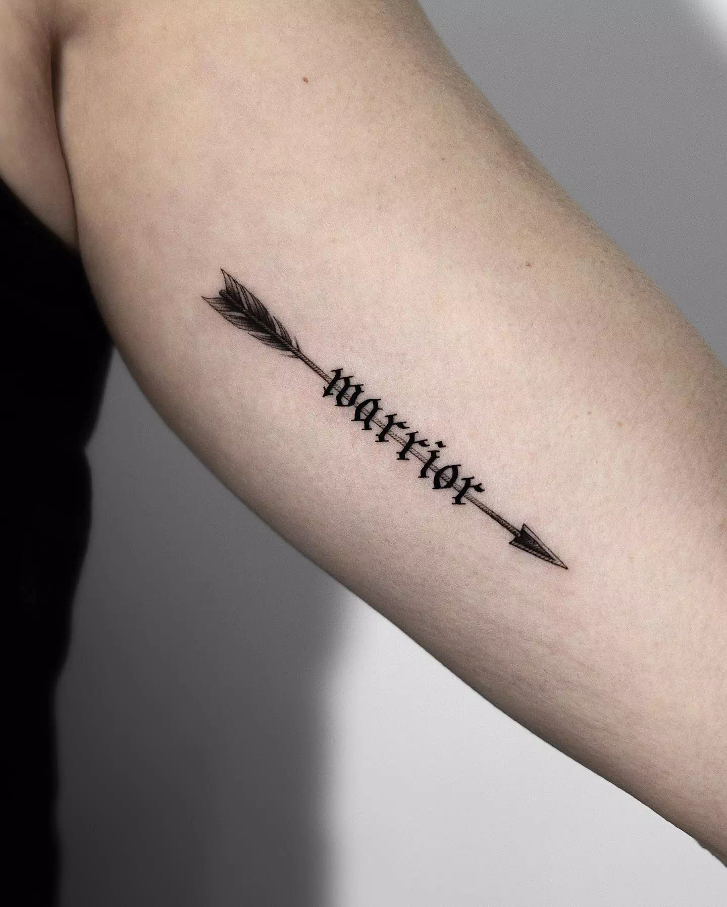 Arrow tattoo in black and white tattoo 2