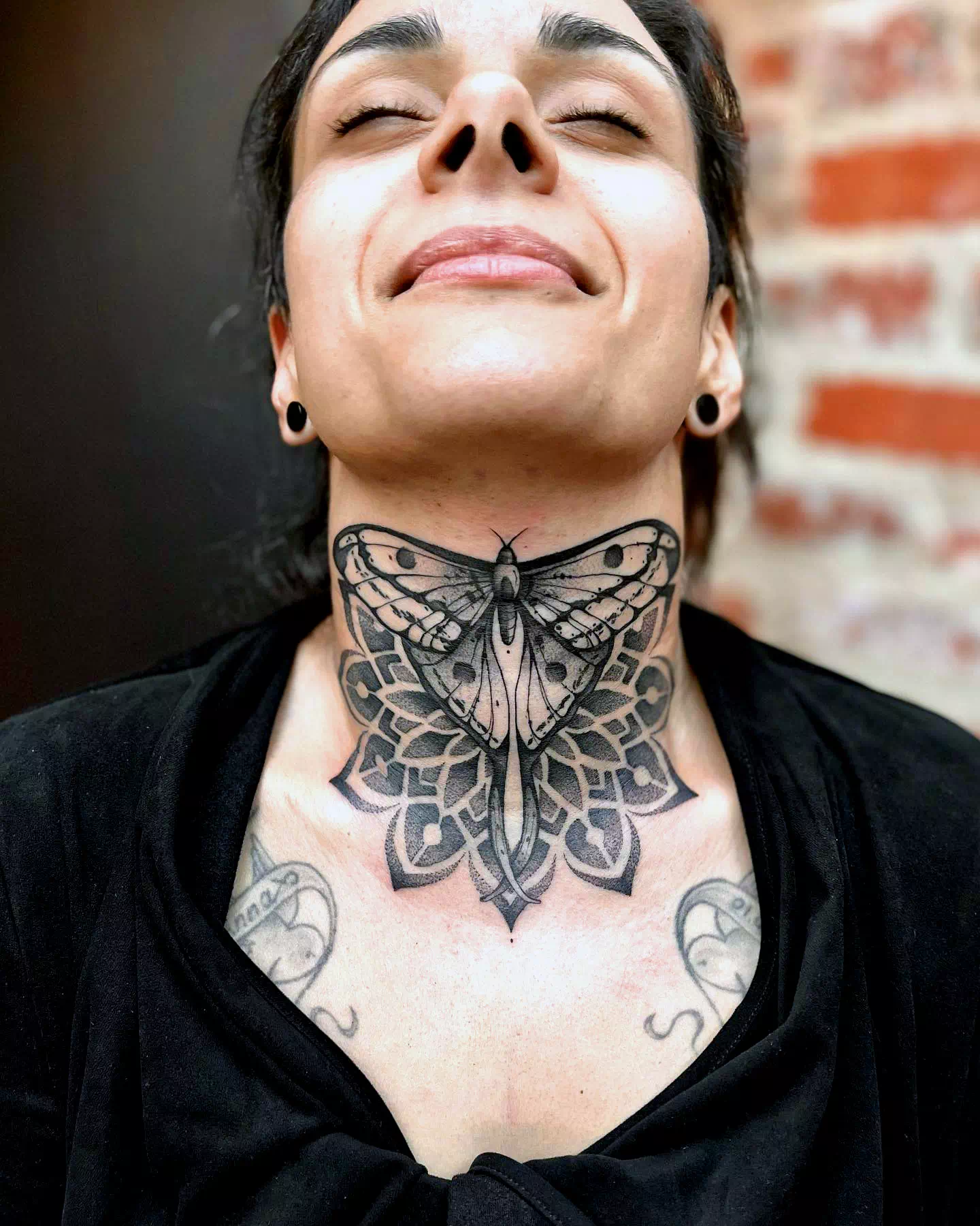 Butterfly neck tattoo 2
