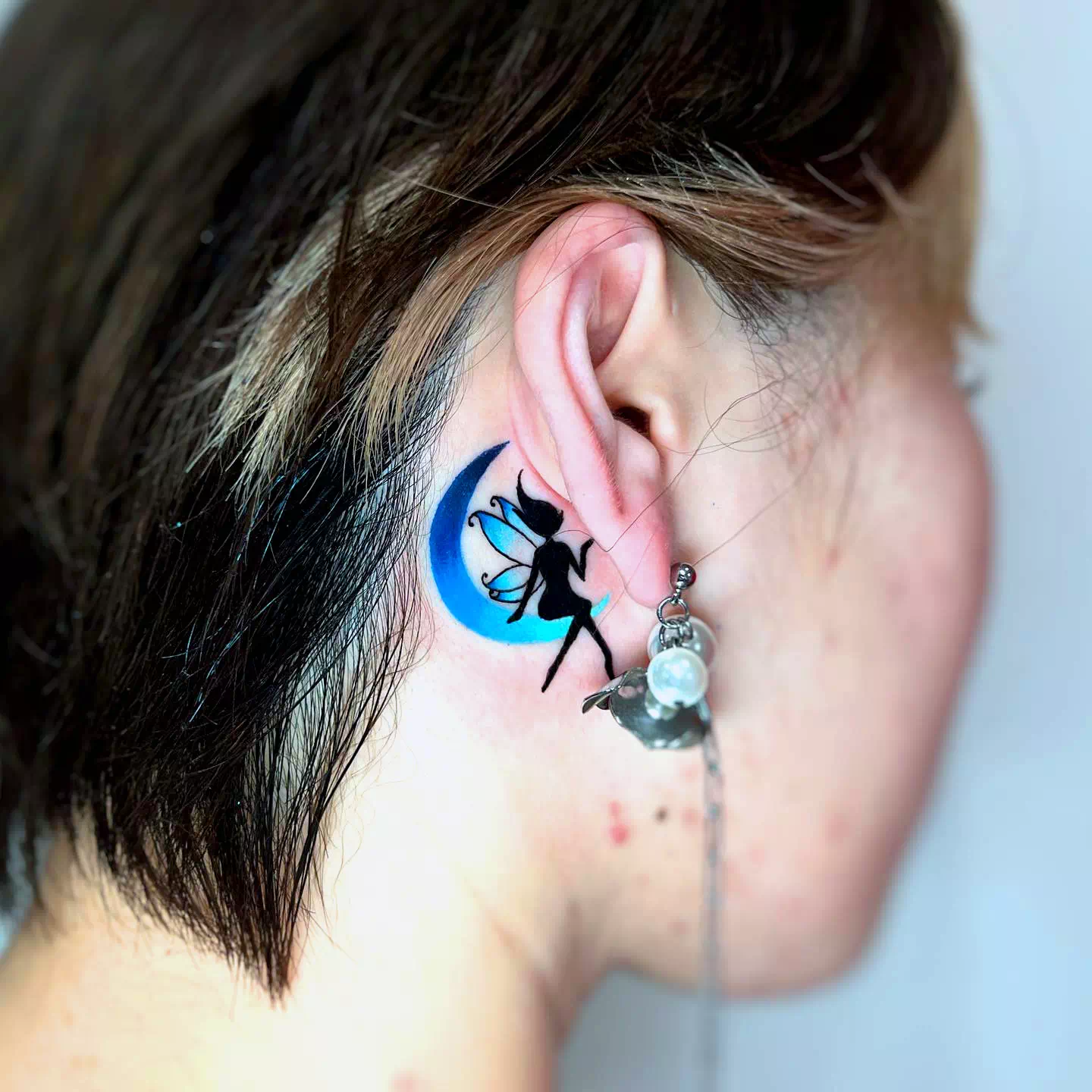 Feminine neck tattoo 1