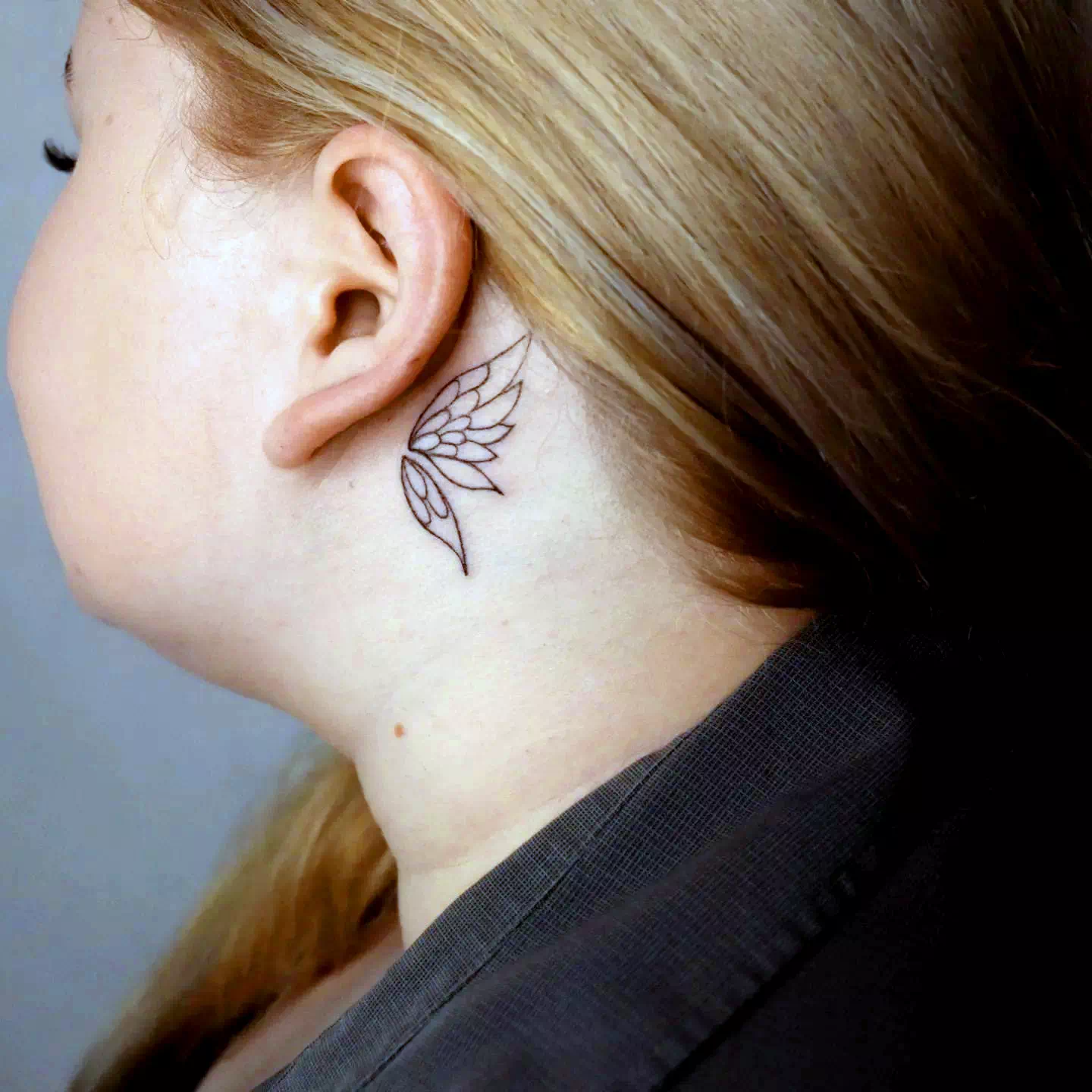 Feminine neck tattoo 5