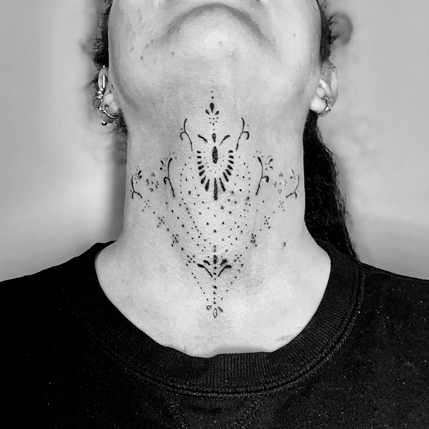 Front neck tattoo 2