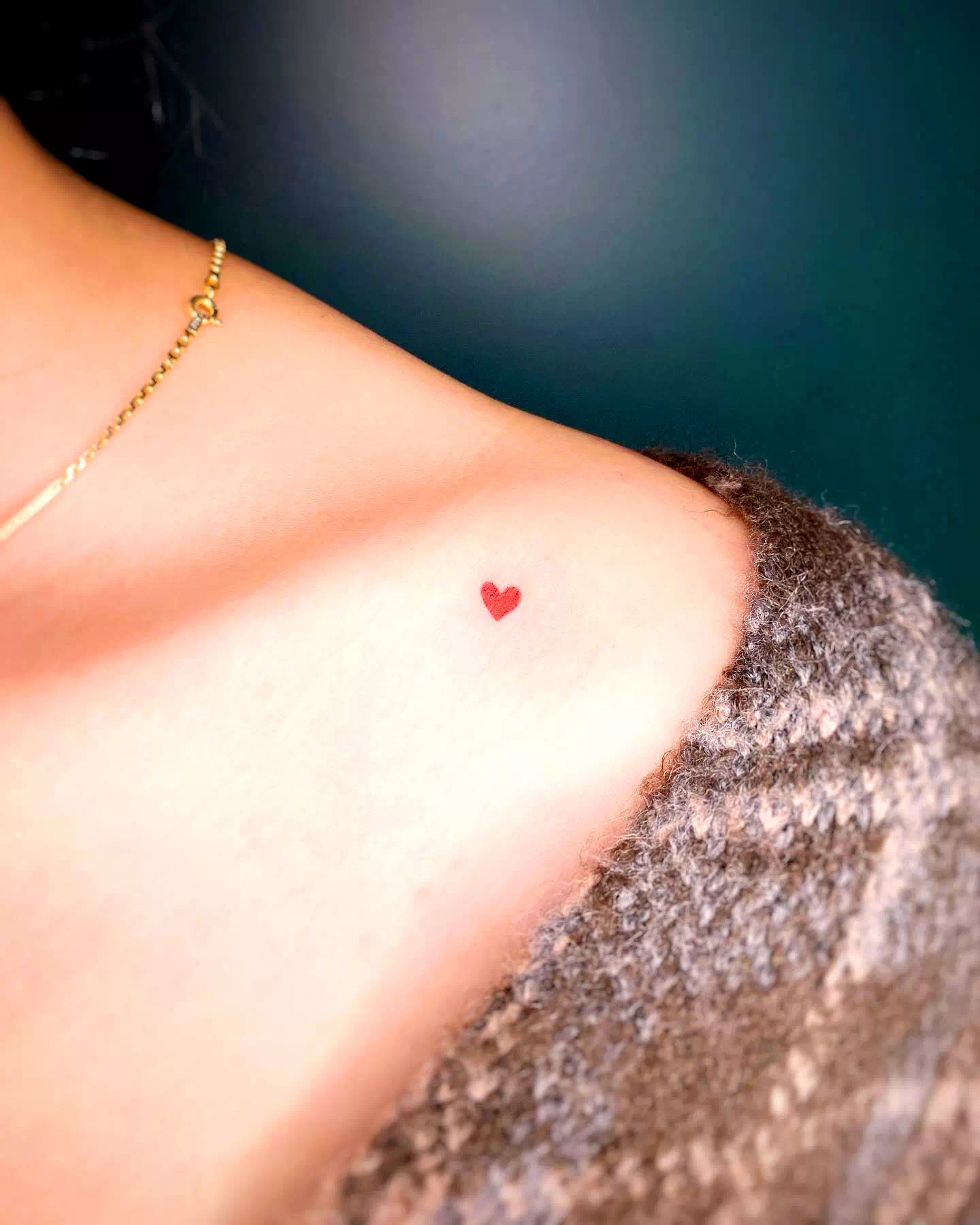 Heart neck tattoo 2