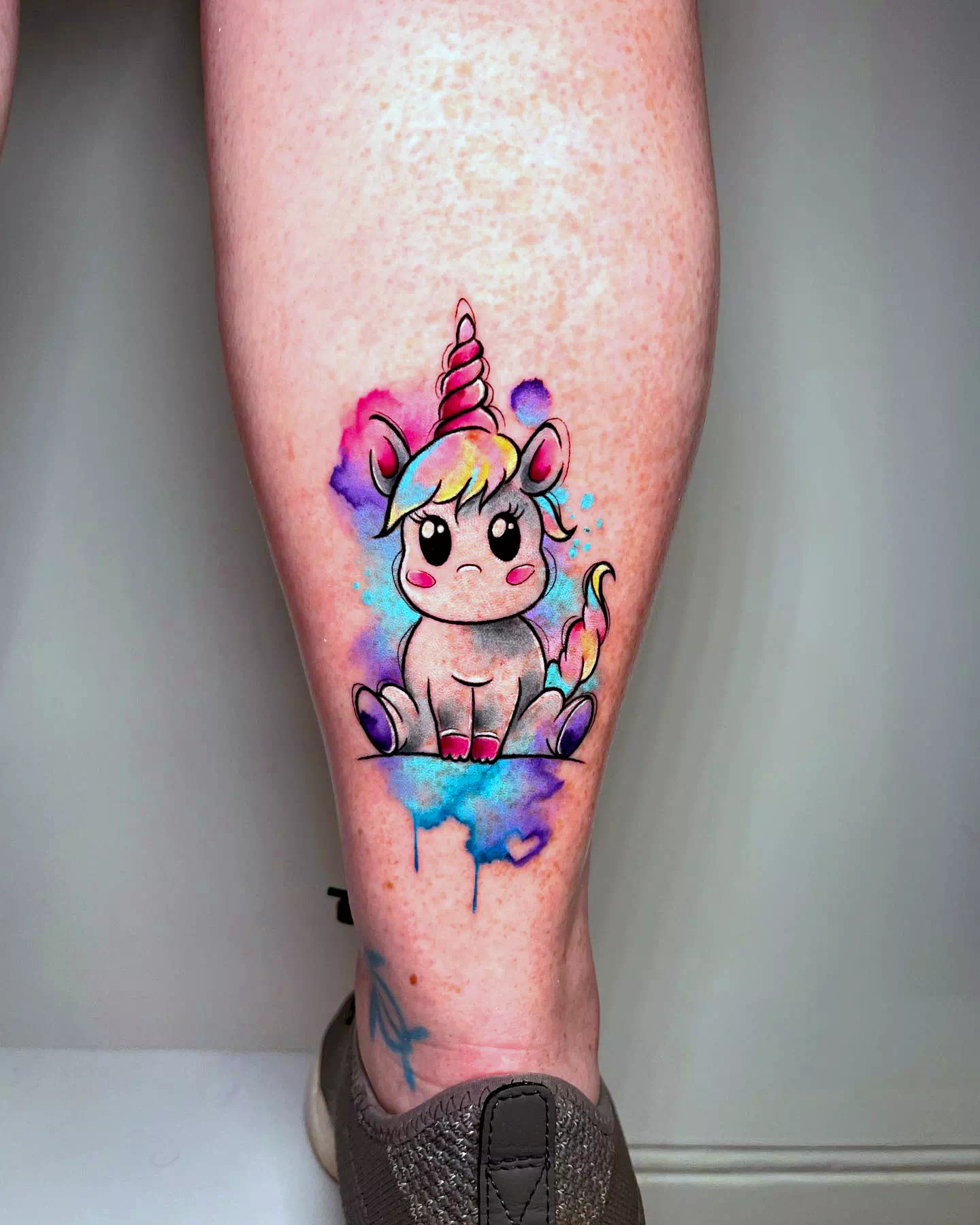 Loud Colorful Forearm Outline Unicorn Tattoo