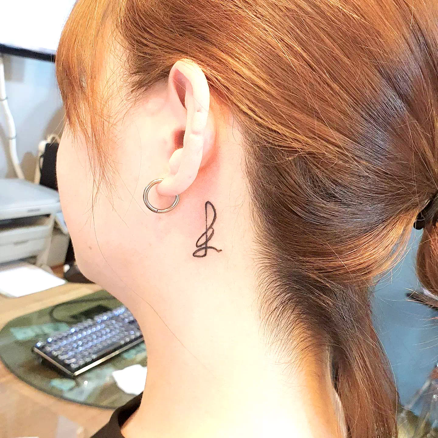 Music notes neck tattoo 3