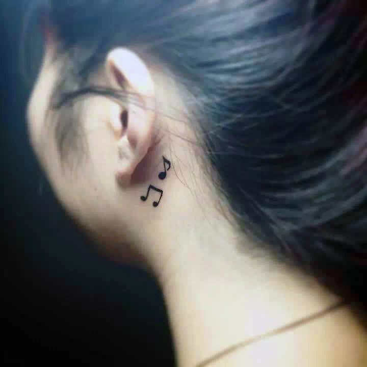 Music notes neck tattoo 4
