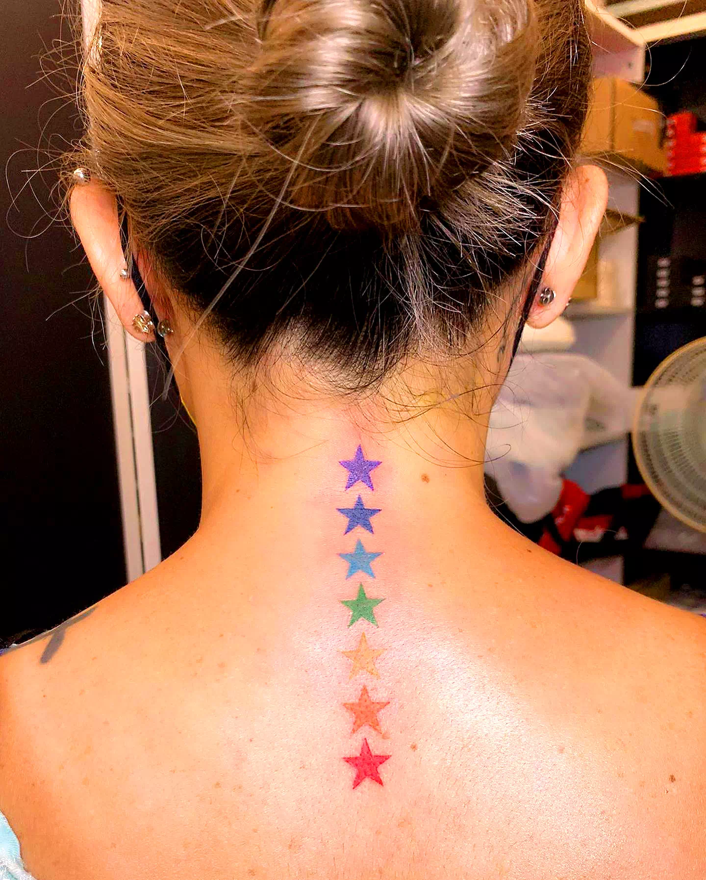 Star neck tattoo 5