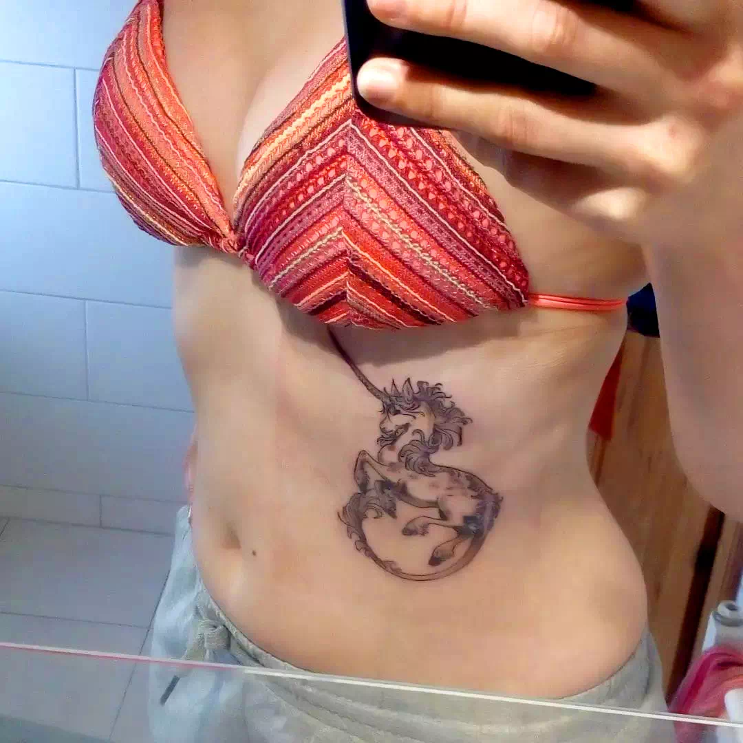 Stomach Unicorn Tattoo