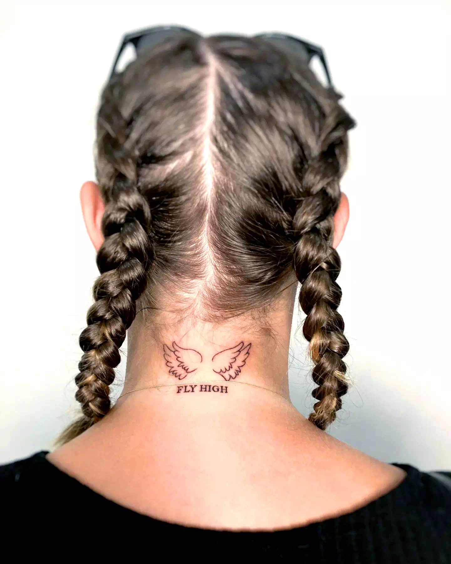 Wings neck tattoo 4