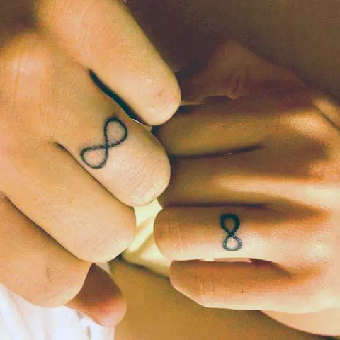 Infinity Traditional Wedding Ring Tattoo 3